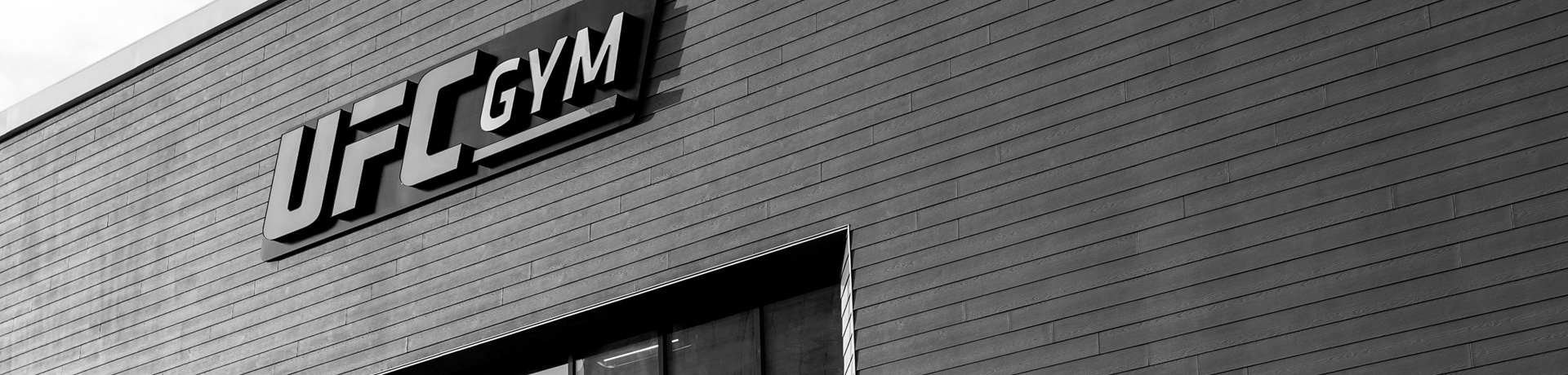black and white photo of UFC Gym building exterior