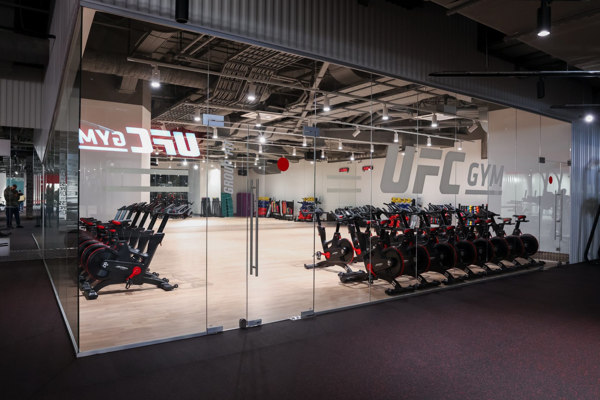 photo of UFC gym with glass walls and workout equipment